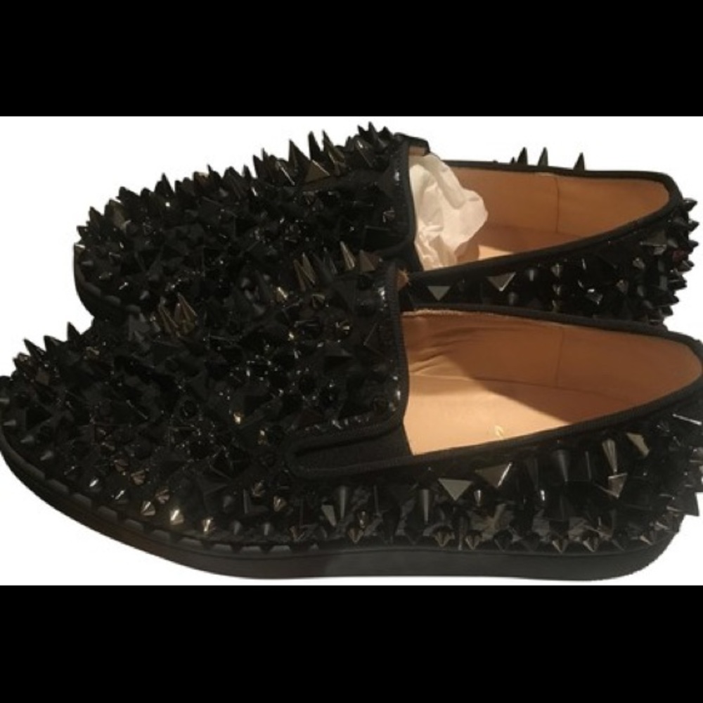 Christian Louboutin
Black Roller Boat Pik Pik Boot
